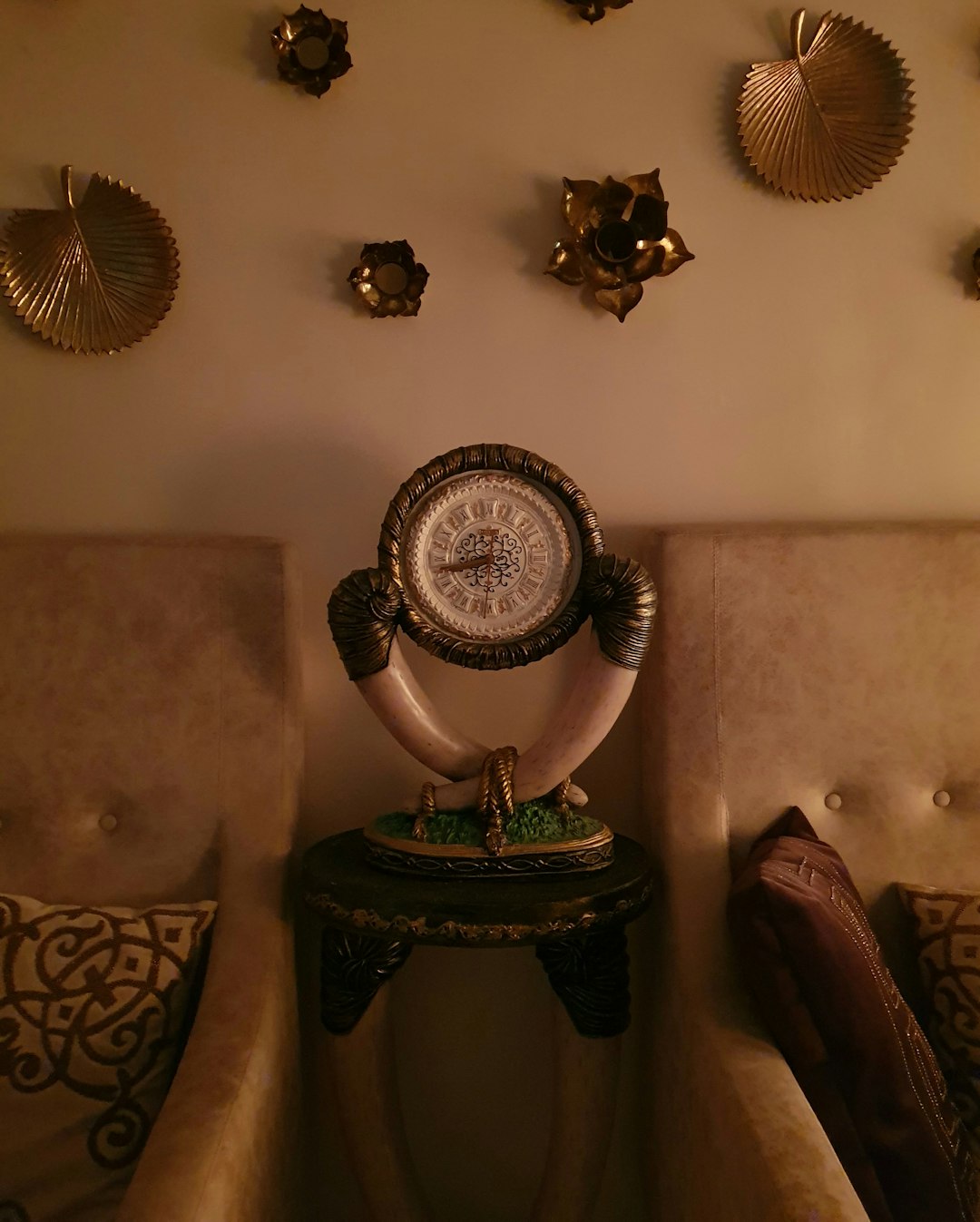 Conclusion: Your Home, Your Masterpiece 🏆 by Home Decorations a clock sitting on top of a table next to two chairs